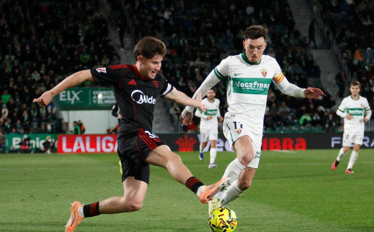 西班牙足球甲级联赛西甲第20轮：塞维利亚2球落后两次追平埃尔切终结四连败