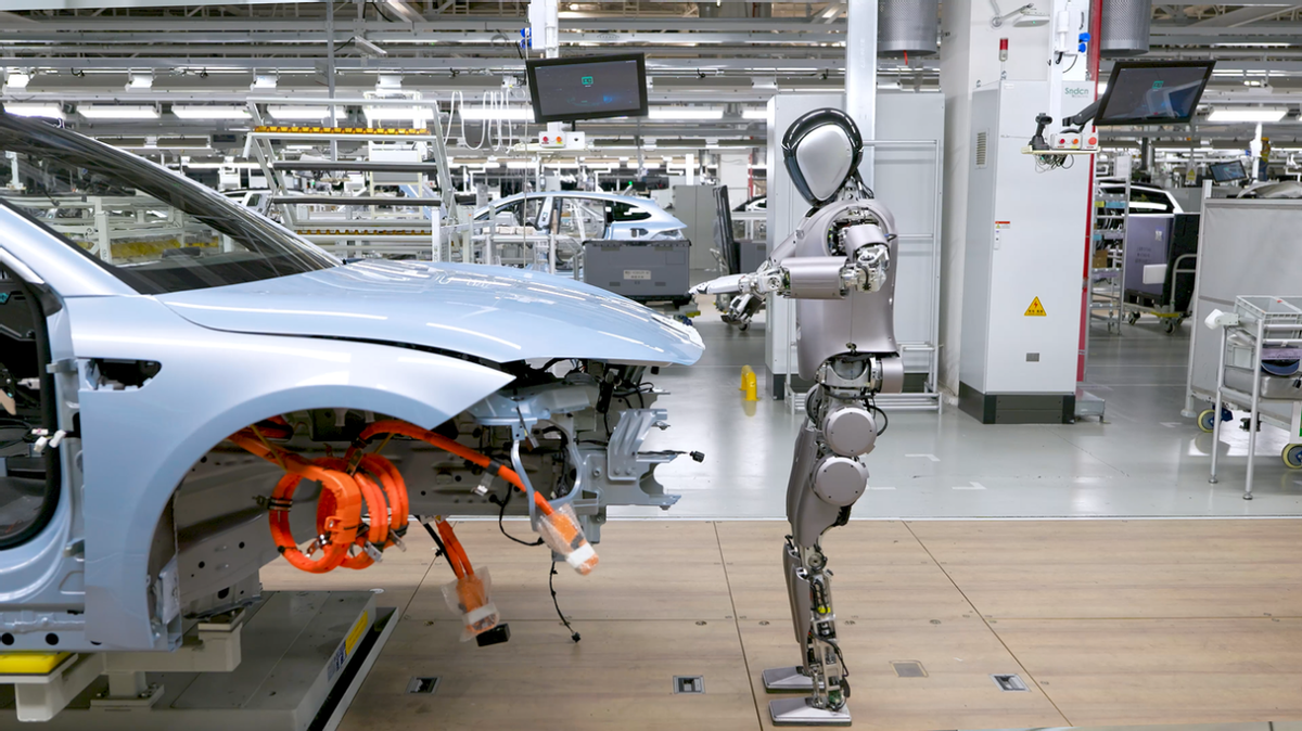 汽车工厂与人类协作的机器人也能降低因为人工装配对产品设计的限制