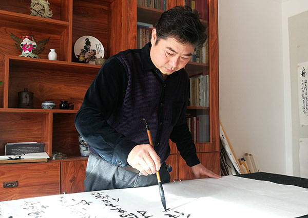 学无止境 永攀高峰——访著名书画家王文智_书法_部队_父亲