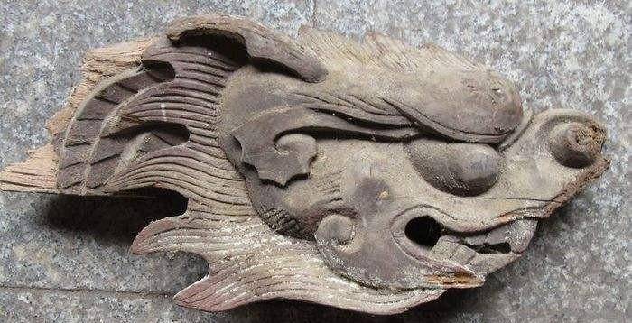 原创山西一农民珍藏龙头木雕被盗后立刻报案经调查发现他是朱元璋后代