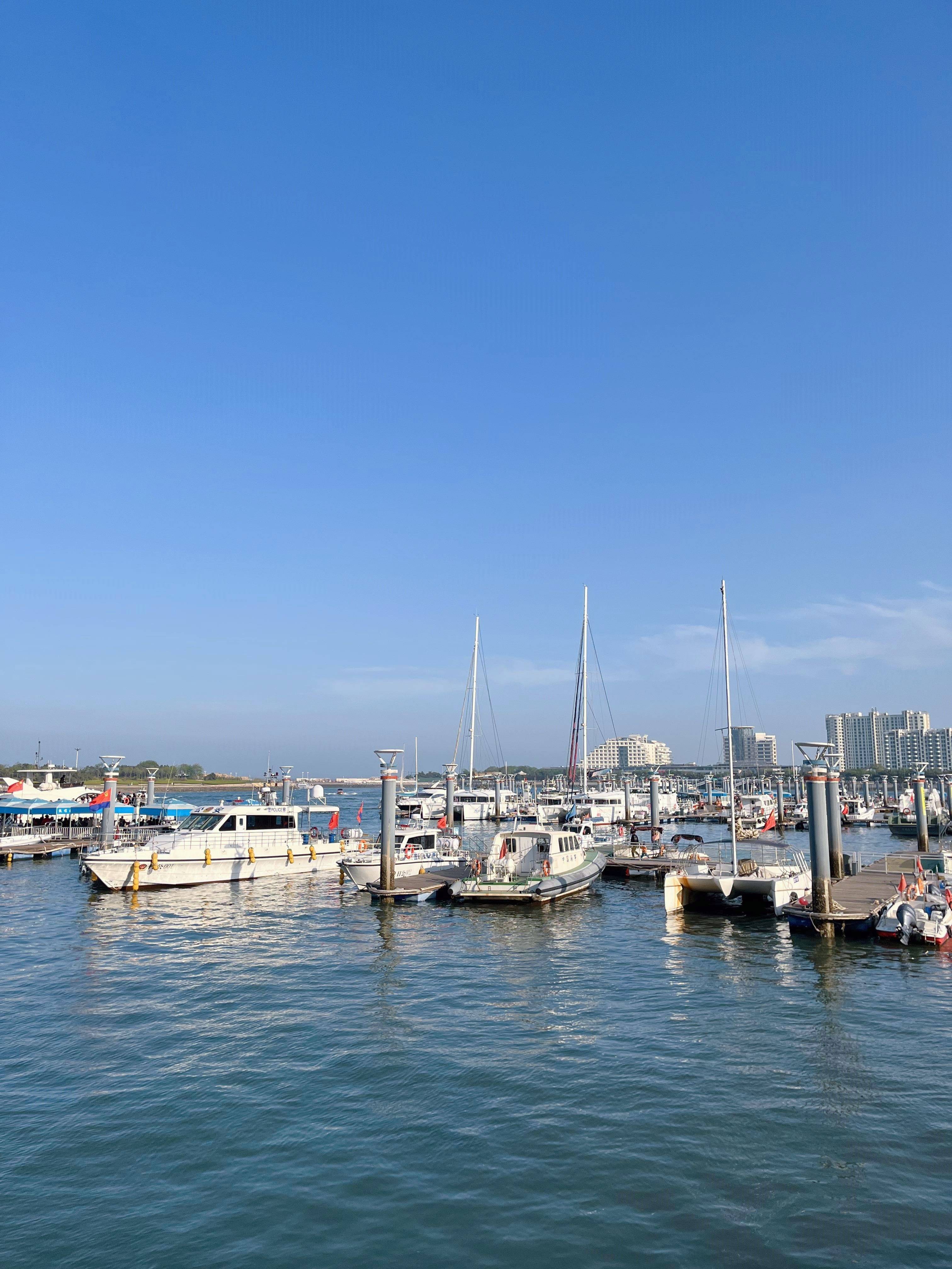 泻湖大桥89看日出推荐去:灯塔,太公岛,万平口,三浴场等,日照的海边