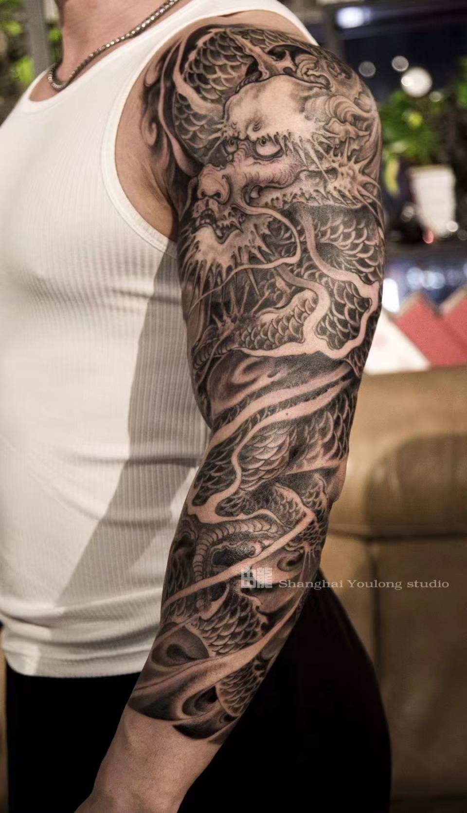 花臂龙纹身中国龙对健身者而言,是刻在皮肤上的「东方力量哲学」