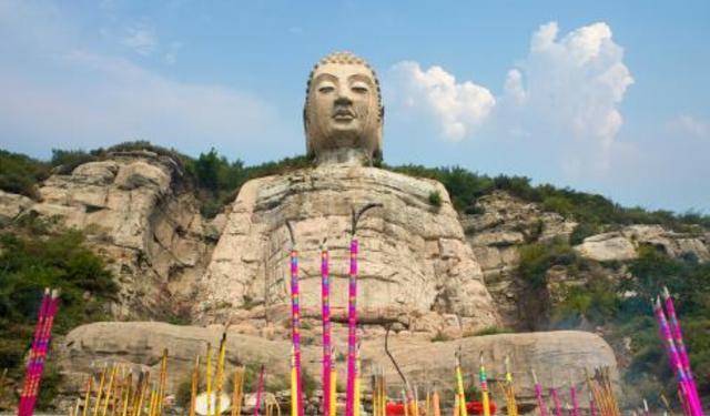 原创63米高的蒙山大佛消失600年后再次问世经历了什么坎坷