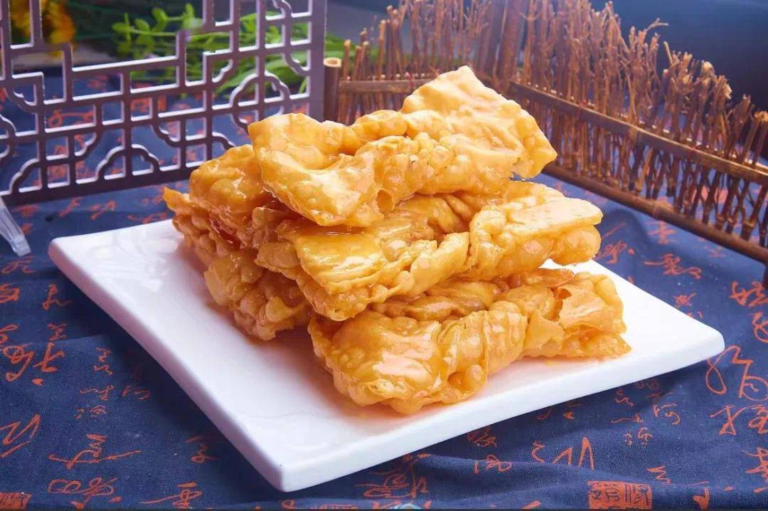 年前"开油镬"的品种除了有煎堆,还有油角,茶泡,笑口枣,蛋散等面粉类