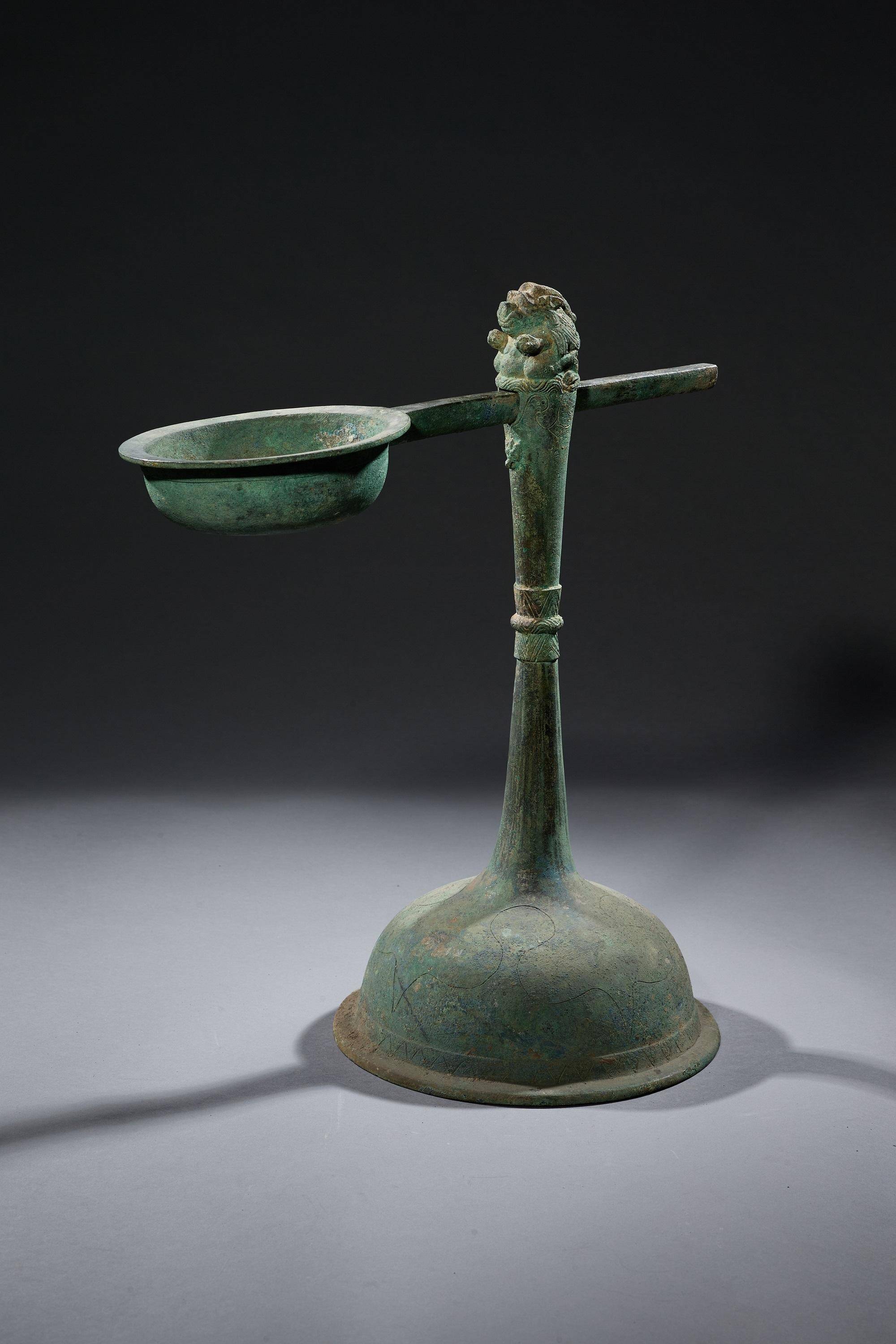 象征着权力与威望是墓主人身份等级的象征"华丽转身"熨斗有了更多功能