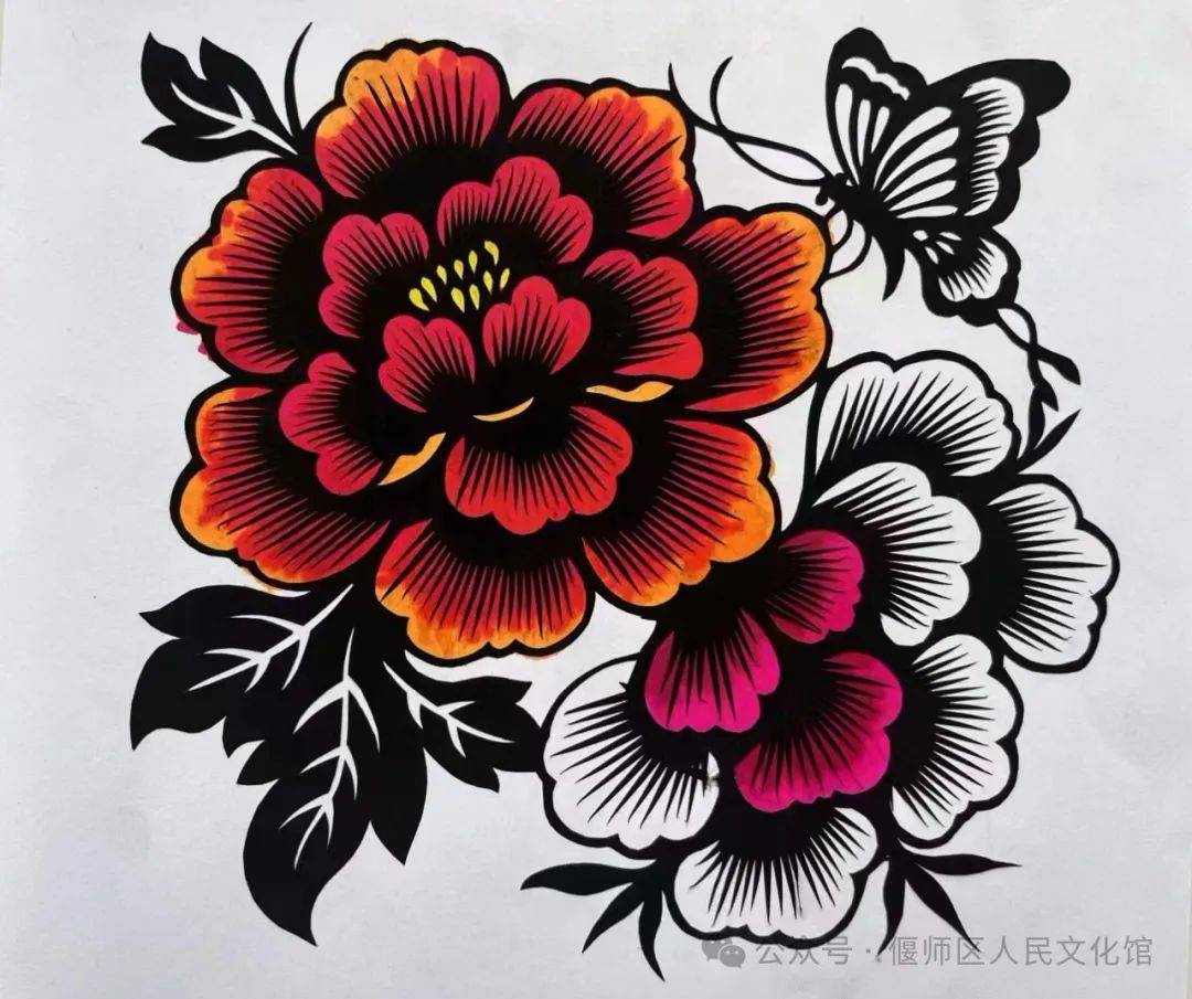 洛阳非遗剪纸人剪下的牡丹