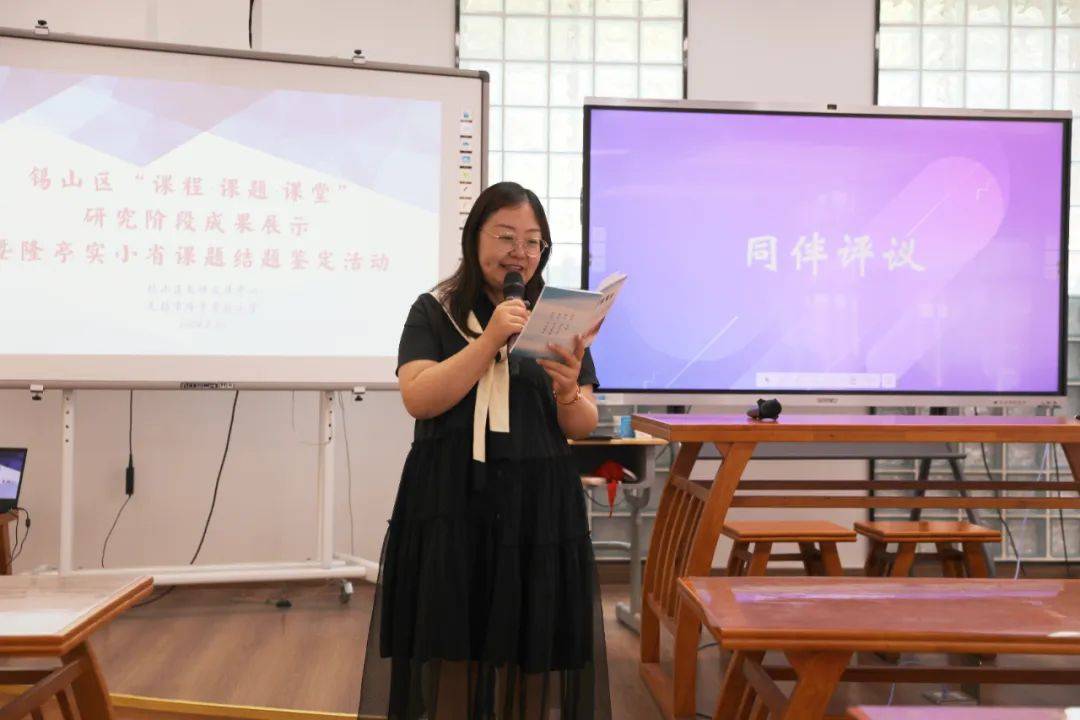 锡山实小华丽老师认为虞老师以课本学习为起点,通过小标题把握长文