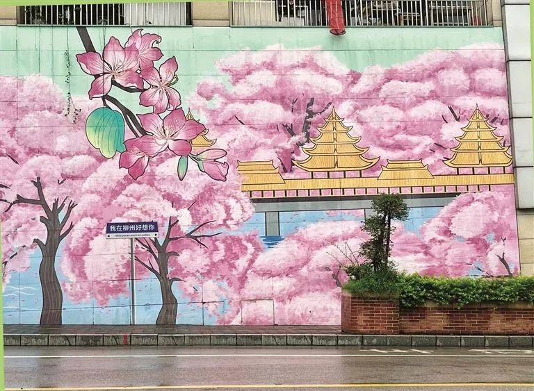 墙上不光有"新能源汽车",还结合了"柳州螺蛳粉""文庙""紫荆花"等柳州