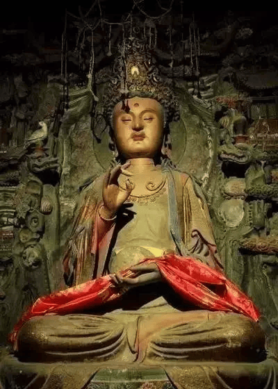 观音菩萨文殊菩萨后殿左右两山墙壁之上,分别塑有密宗两大本尊"孔雀