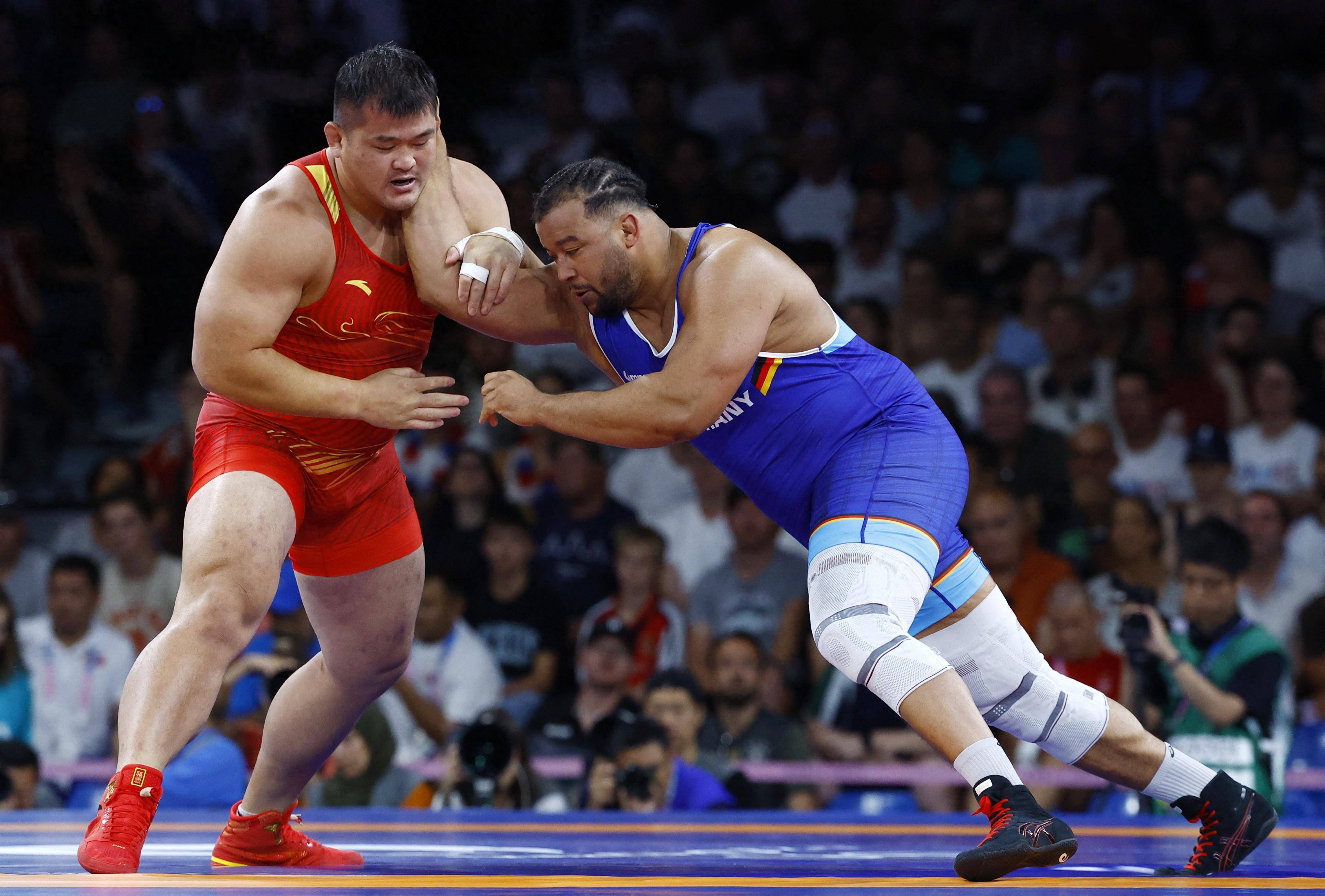 为备战奥运,中国男子古典式摔跤选手孟令哲特意推迟婚期_比赛_山东