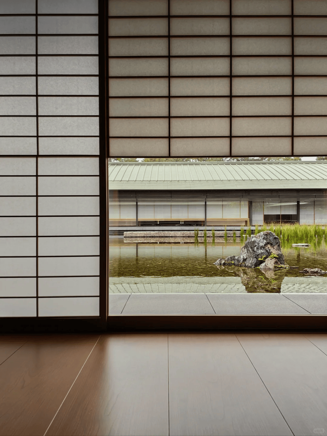 建筑群围绕日式庭院展开,通过"缘侧"