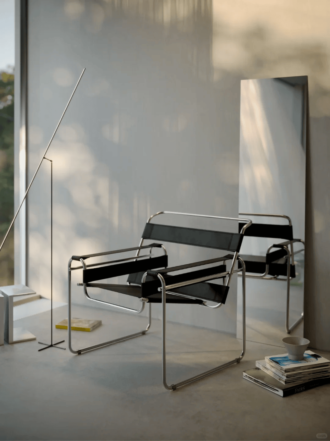 ・布劳耶于 1925 年设计的瓦西里椅,因首次应用新材料弯曲钢管制