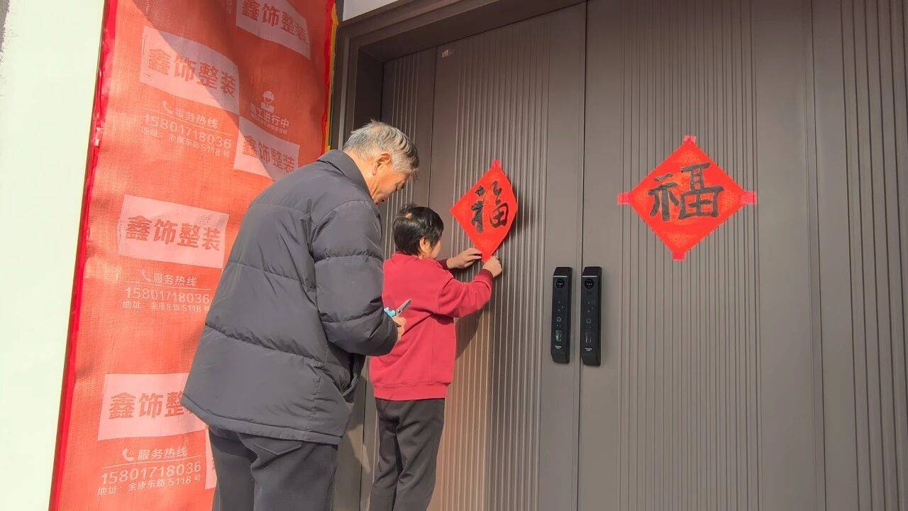 开心!村民喜迁新居迎新春_新村_建设_服务